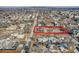 Home with a large lot in a residential area, outlined in red for emphasis at 5300 Balsam St, Arvada, CO 80002
