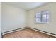 A bedroom with a double hung window at 5300 Balsam St, Arvada, CO 80002