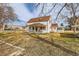 Charming two-story home with a quaint front porch and red shutters, perfect curb appeal at 5300 Balsam St, Arvada, CO 80002