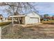 Detached one car garage with an attached covered outdoor living area at 5300 Balsam St, Arvada, CO 80002
