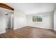 Bright and spacious bedroom with wood floors and large window for natural light at 1801 Buttercup Rd, Elizabeth, CO 80107