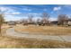 Scenic neighborhood park featuring walking paths and inviting green spaces for recreation at 6284 N Genoa Way, Aurora, CO 80019