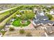 Backyard features a pond, playground and patio at 2161 Elmwood St, Berthoud, CO 80513