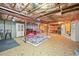 Unfinished basement with exposed ceiling showing potential for customization at 2161 Elmwood St, Berthoud, CO 80513
