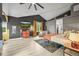 Stylish bedroom featuring a modern aesthetic, warm lighting, and comfortable seating area, a true relaxation haven at 2161 Elmwood St, Berthoud, CO 80513