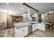 Spacious kitchen with an expansive island and breakfast bar, ideal for entertaining and casual dining at 2161 Elmwood St, Berthoud, CO 80513