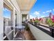 Balcony with outdoor seating, flowers and views at 1475 Delgany St # 306, Denver, CO 80202