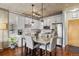 Charming kitchen and dining area featuring stainless steel appliances, modern lighting, and light countertops at 1475 Delgany St # 306, Denver, CO 80202