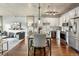 Open living space featuring updated kitchen, dining area and modern furniture and fixtures throughout at 1475 Delgany St # 306, Denver, CO 80202
