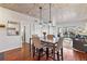 Open living space featuring dining area, updated kitchen, modern furniture and fixtures throughout at 1475 Delgany St # 306, Denver, CO 80202