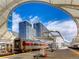 Scenic view of a train station featuring a modern terminal and cityscape in the background at 1475 Delgany St # 306, Denver, CO 80202