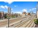 City views featuring modern buildings and train tracks, offering an urban landscape at 1475 Delgany St # 306, Denver, CO 80202