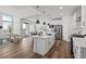 Contemporary kitchen boasts a large island, stainless appliances, and an open layout at 8242 S Pierson St, Littleton, CO 80127