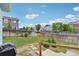 Well-kept backyard with green grass and a charming fire pit, ideal for outdoor gatherings and relaxation at 13802 Jasmine St, Thornton, CO 80602
