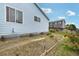 Well-maintained backyard with garden beds, offering a great space for gardening and outdoor enjoyment at 13802 Jasmine St, Thornton, CO 80602