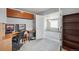 Dedicated home office space with built-in storage and natural light, perfect for remote work or study at 13802 Jasmine St, Thornton, CO 80602