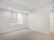 Finished basement with ample natural light, neutral carpet, and ample space at 2961 S Cherokee, Englewood, CO 80110