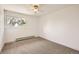 Simple bedroom with neutral carpet and a window at 12196 W Belleview Dr, Littleton, CO 80127