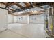 Unfinished basement featuring white wrapped walls, exposed ductwork, and concrete floor at 2247 Eagles Nest Dr, Lafayette, CO 80026