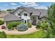 Beautiful single Gathering home with a well manicured yard, mature trees, and elegant stone accents at 2247 Eagles Nest Dr, Lafayette, CO 80026