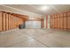 Spacious three car garage with ample room for parking and storage, perfect for car enthusiasts or hobbyists at 2247 Eagles Nest Dr, Lafayette, CO 80026