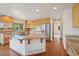 Modern kitchen with granite countertops, stainless steel appliances, and a central island at 2247 Eagles Nest Dr, Lafayette, CO 80026
