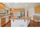 Well-equipped kitchen with granite countertops, stainless steel appliances, and lots of cabinet space at 2247 Eagles Nest Dr, Lafayette, CO 80026
