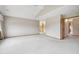 Spacious main bedroom with neutral tones, carpet flooring, and a ceiling fan for added comfort at 2247 Eagles Nest Dr, Lafayette, CO 80026
