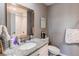 Bathroom featuring a granite countertop, modern faucet, and sink at 256 Ash St, Bennett, CO 80102