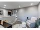 Charming Bedroom room with stylish decor and a cozy chair, perfect for relaxation and creating a soothing atmosphere at 256 Ash St, Bennett, CO 80102