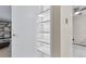 Open closet with shelving and light fixture at 3022 S Wheeling Way # 107, Aurora, CO 80014