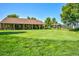 Beautiful golf course with manicured green, landscaping and outdoor lounge at 3022 S Wheeling Way # 107, Aurora, CO 80014