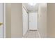 Entry hallway featuring tile flooring, closet, and front door at 3022 S Wheeling Way # 107, Aurora, CO 80014