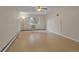 Spacious living room has a window and a ceiling fan for comfort at 3022 S Wheeling Way # 107, Aurora, CO 80014