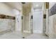 Communal shower area featuring multiple individual shower stalls, designed for privacy and convenience at 3022 S Wheeling Way # 107, Aurora, CO 80014
