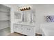 Elegant bathroom with double vanity, white cabinets, and large mirror at 5051 Yates Cir, Broomfield, CO 80020