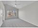 Spacious bedroom with vaulted ceiling, neutral carpet, and large window at 5051 Yates Cir, Broomfield, CO 80020