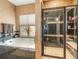 Beautiful bathroom with a large tub, separate shower, and neutral-toned wallpaper, creating a spa-like atmosphere at 1660 Prominence Cir, Elizabeth, CO 80107