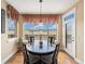 Cozy breakfast nook with window views and access to a deck at 1660 Prominence Cir, Elizabeth, CO 80107