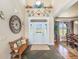 Elegant foyer with slate floors, a front door with sidelights, and decorative accents, creating a welcoming entrance at 1660 Prominence Cir, Elizabeth, CO 80107