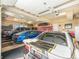 Spacious garage with room for multiple vehicles and a dedicated workspace at 1660 Prominence Cir, Elizabeth, CO 80107