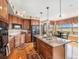 Spacious kitchen with granite countertops, stainless steel appliances, and breakfast nook at 1660 Prominence Cir, Elizabeth, CO 80107