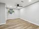 Bedroom featuring a ceiling fan, recessed lighting, and wood floors at 1333 W Peakview Ave, Littleton, CO 80120