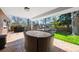 Covered patio area with comfortable seating, perfect for outdoor dining and entertaining guests at 7082 W Morraine Dr, Littleton, CO 80128