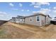 Newly constructed home with neutral siding, fenced yard, and a contemporary design at 19110 E 96Th Pl, Commerce City, CO 80022