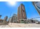 Exterior street view of the high-rise condo building on a sunny day in the city at 1020 15Th St # 18I, Denver, CO 80202