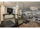 Spacious gym with treadmills, weights, and mirrored walls offering a variety of fitness options at 1020 15Th St # 18I, Denver, CO 80202