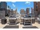 Rooftop grills with city views offer a perfect space for outdoor entertaining and summer barbecues at 1020 15Th St # 18I, Denver, CO 80202