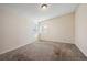 An empty bedroom with plush carpeting, perfect for personalization and comfort at 11565 Decatur St # 7D, Denver, CO 80234