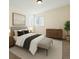 This bedroom features neutral walls, natural light, and minimalist decor for a modern, cozy feel at 11565 Decatur St # 7D, Denver, CO 80234